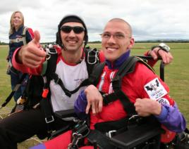 Photograph: Me, my tandem instructor, and Michelle.
